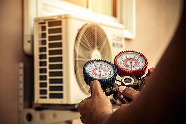 Professional Heat Pump Repair technician working in Dunstable, MA